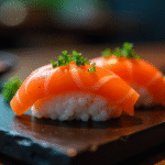 sushi order topped with salmon served on a wooden platte